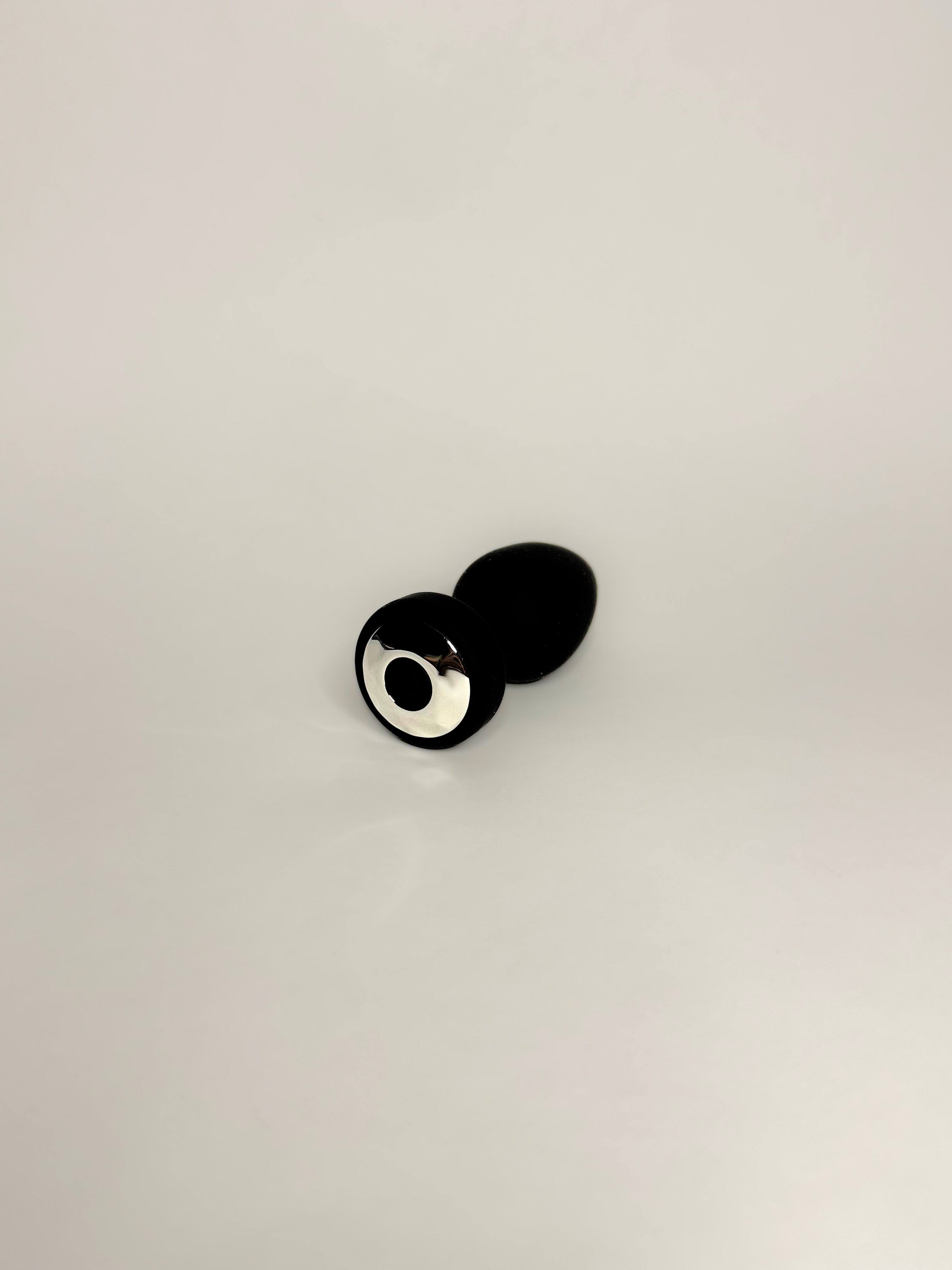 Plug anal vibratório